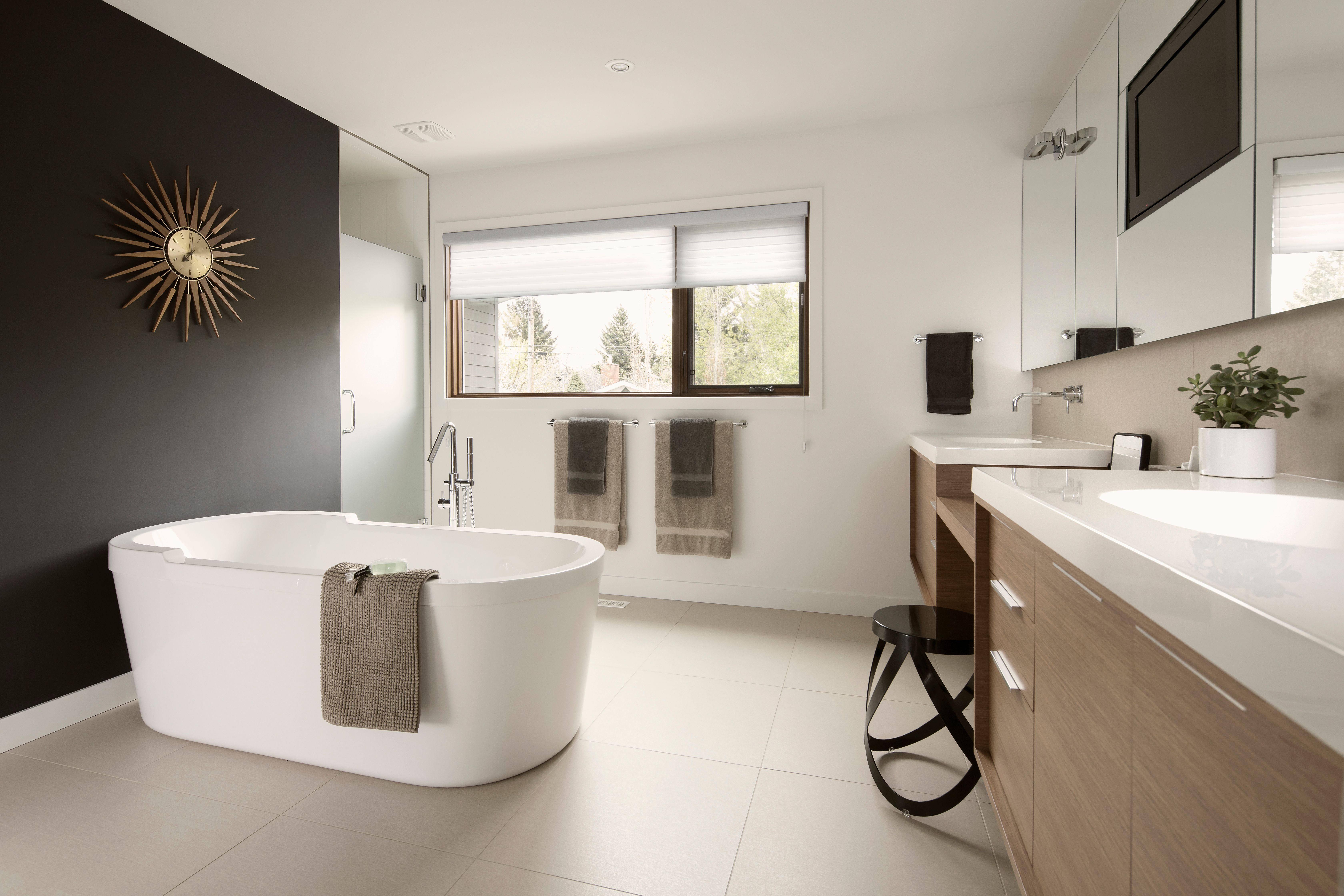 Bathroom with freestanding tub and custom vanity
