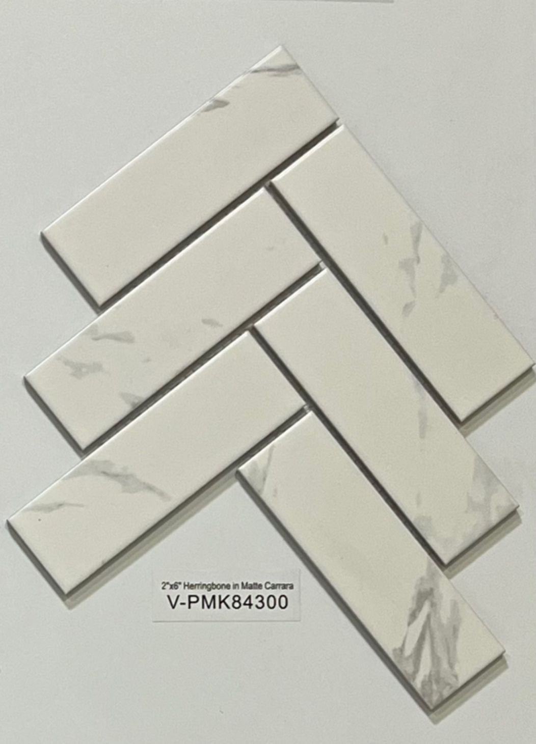 2x6 Herringbone in Matte Black and Carrara