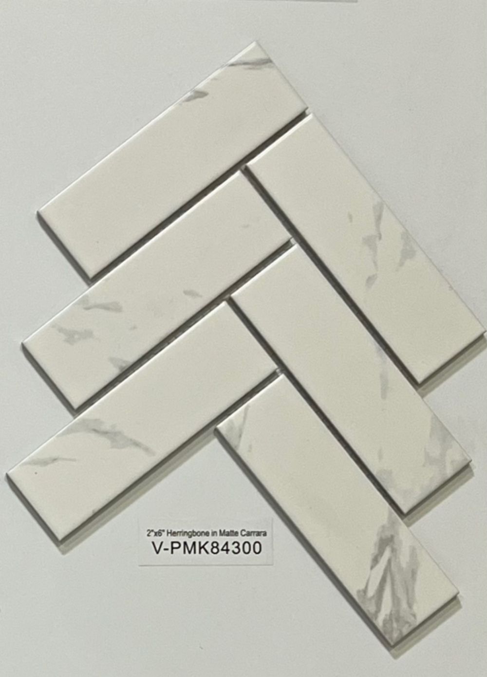 2x6 Herringbone in Matte Black and Carrara