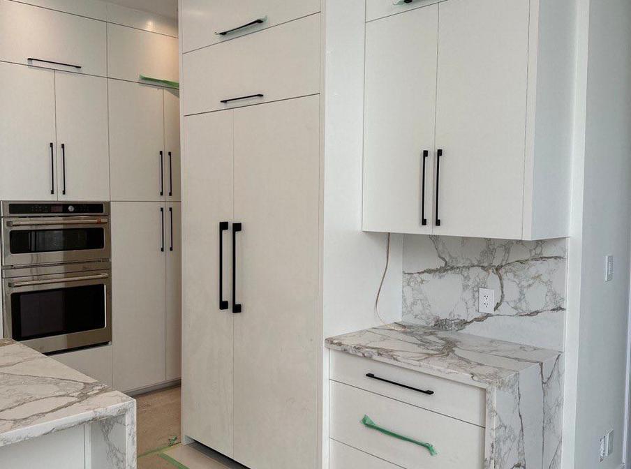 Custom laundry room cabinets by KABCO