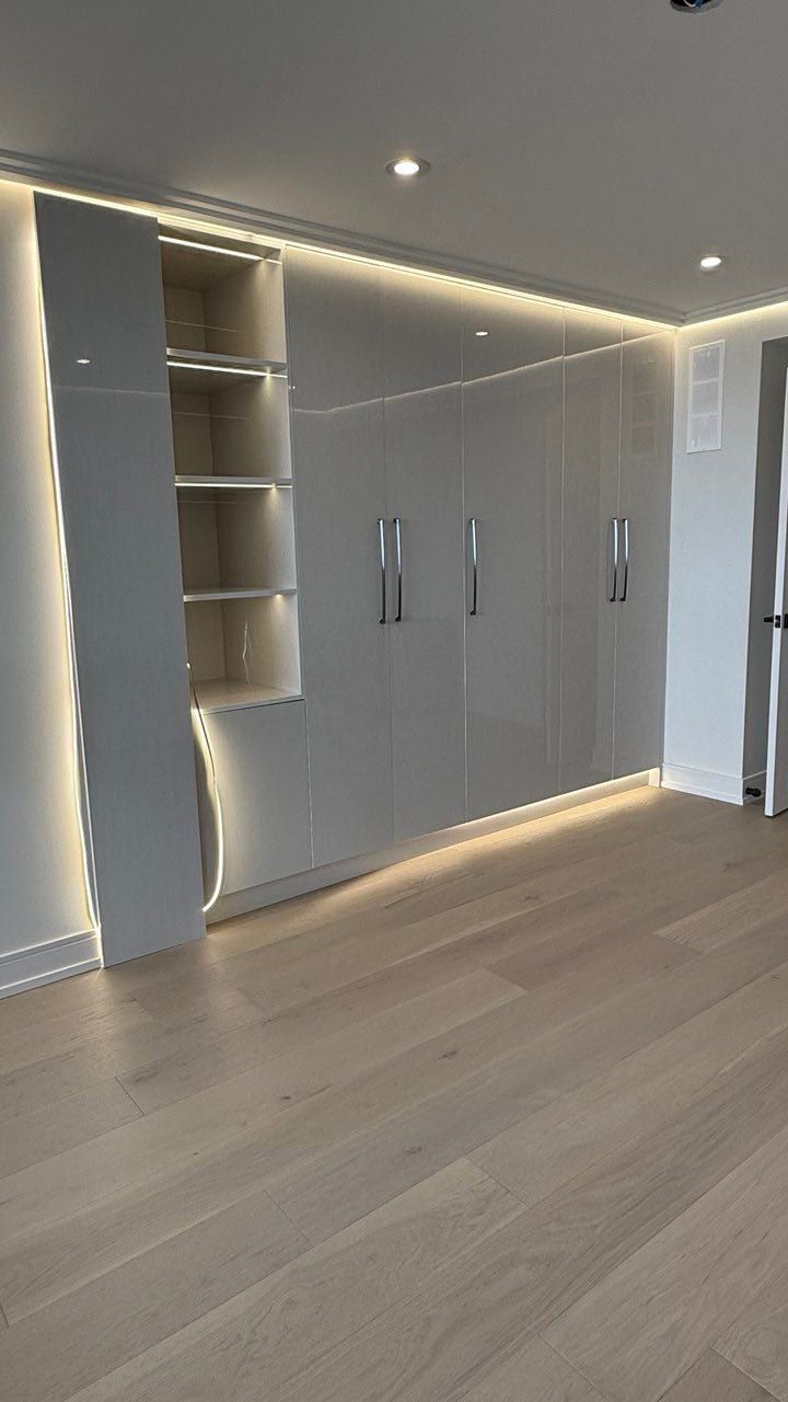 kabco - a room with a lot of cabinets and shelves
